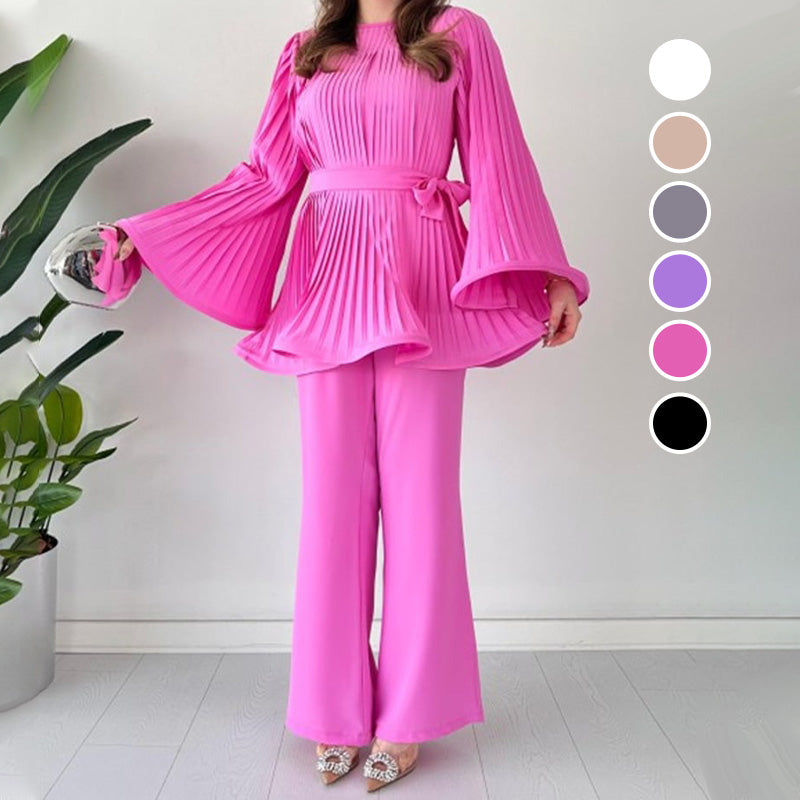 Two-piece suit made of pleated fabric