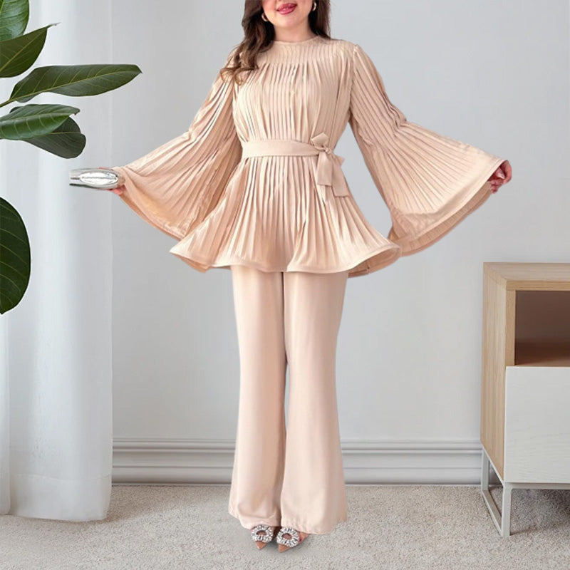 Two-piece suit made of pleated fabric