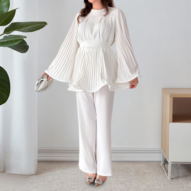 Two-piece suit made of pleated fabric